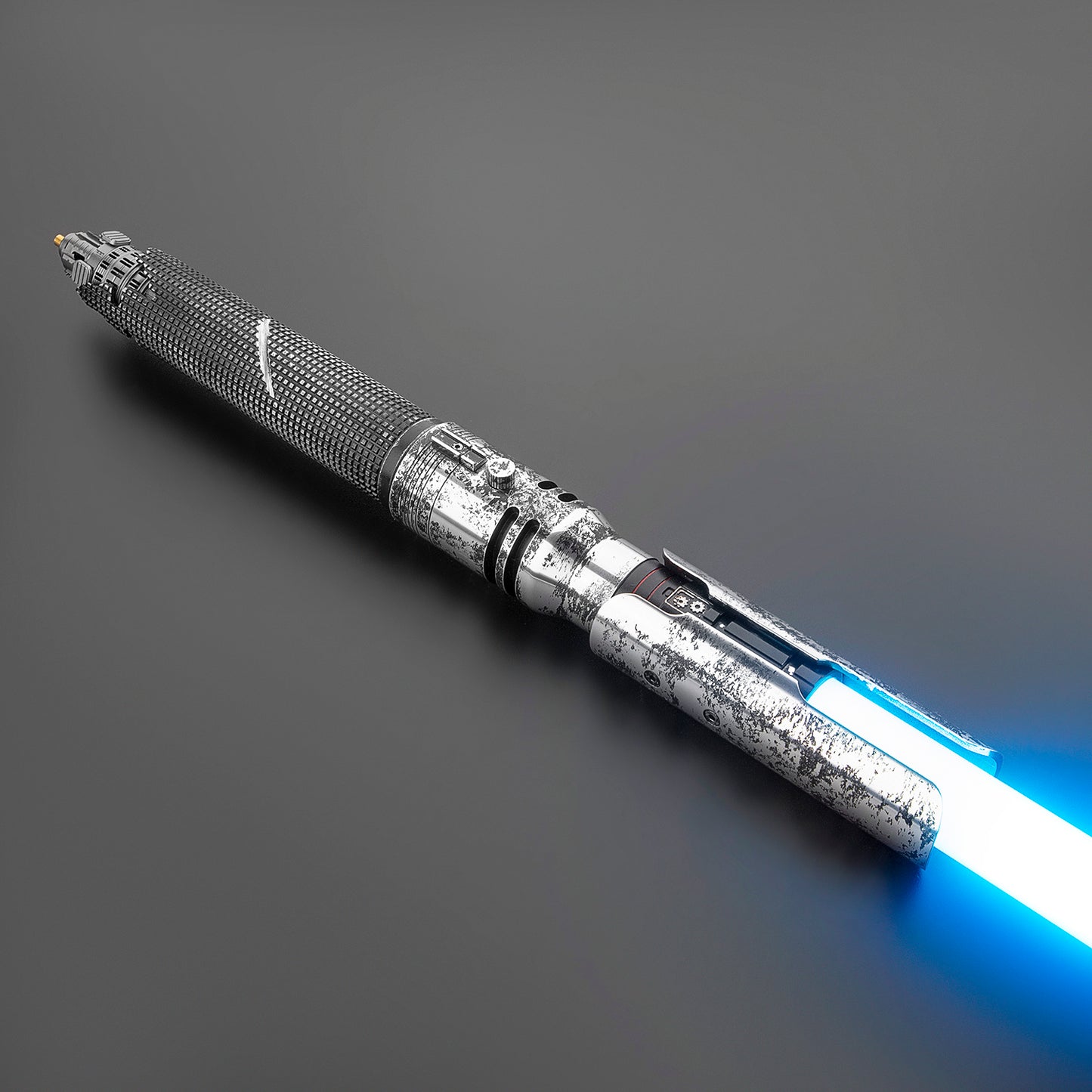 Worn Cal Kestis hilt with glowing blue saber blades – Battle Sabers
