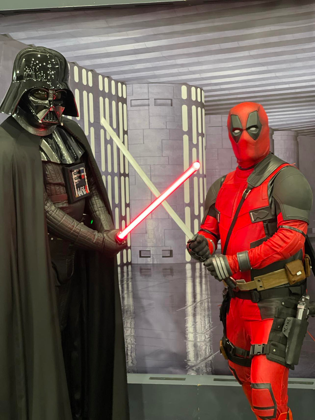 Vader & Deadpool Cosplay with Sabers | Photo Courtesy of CJMCreative