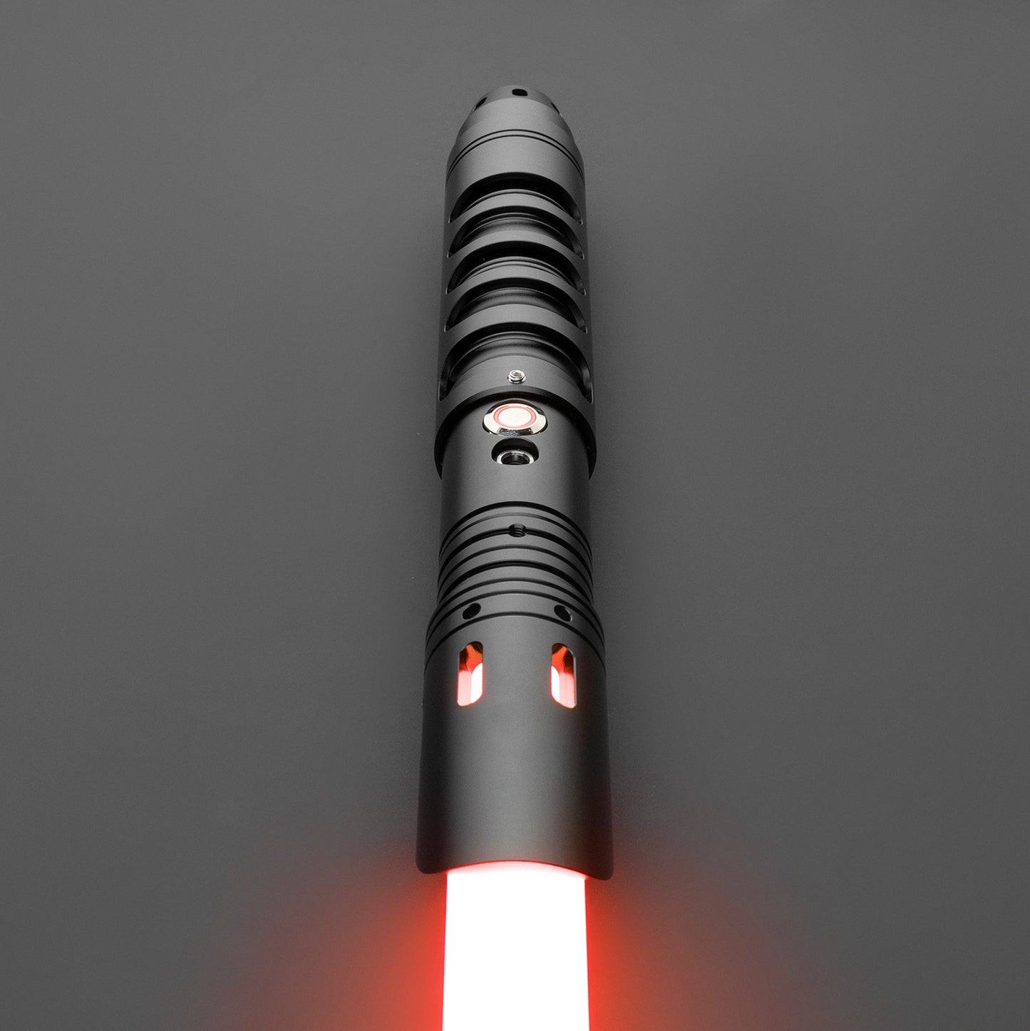 Deceiver Light Saber resting on a black surface - Battle Sabers