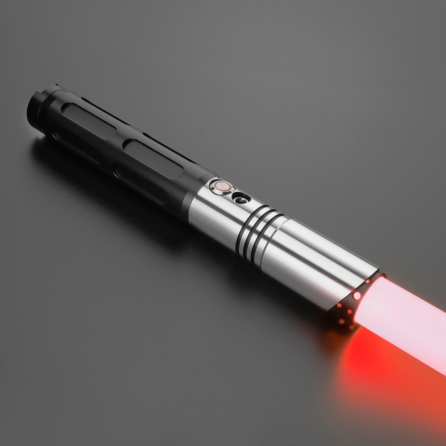 Elegant Flare Light Saber resting on a reflective surface - Battle Sabers