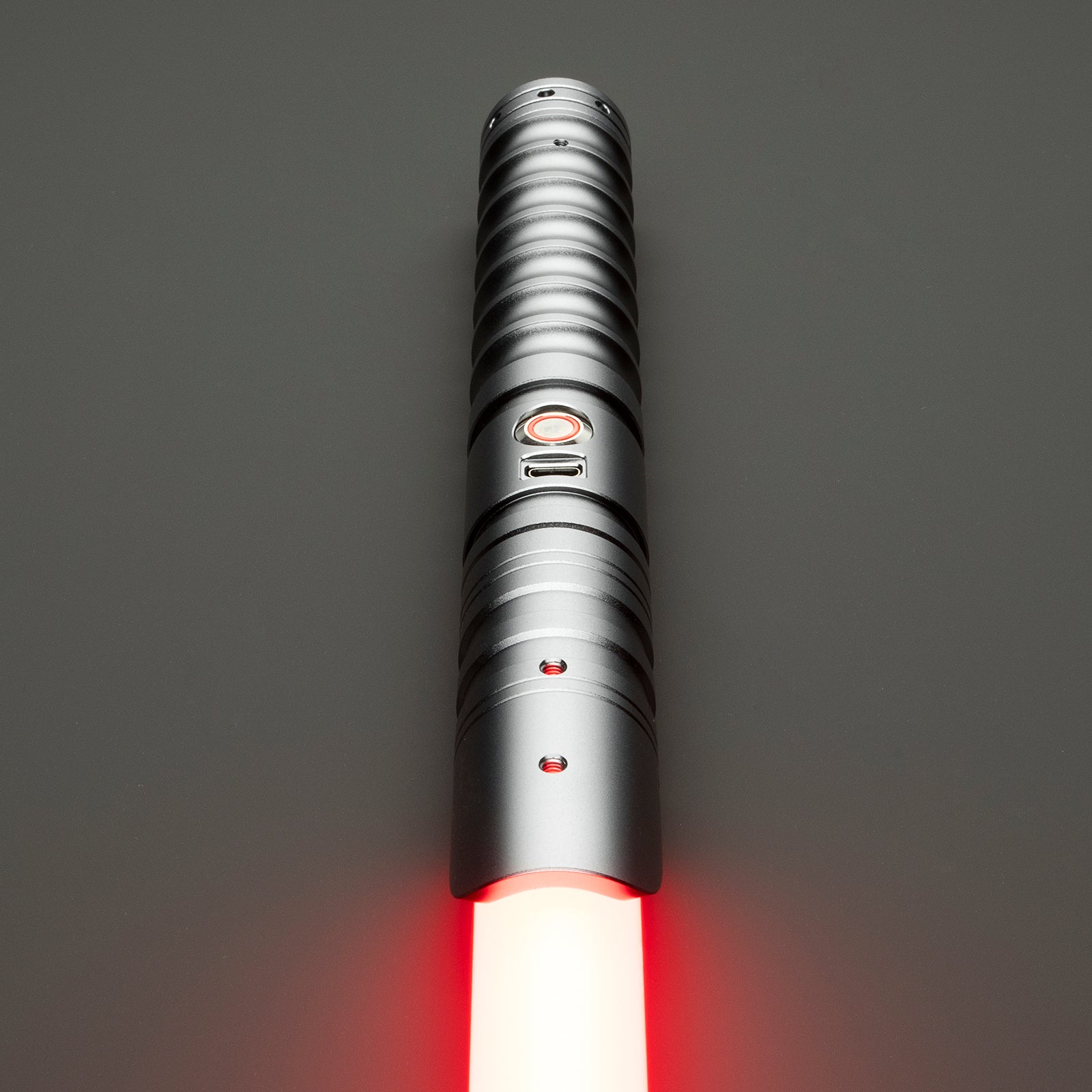 Illuminated silver Force Light Saber glowing in the dark - Battle Sabers