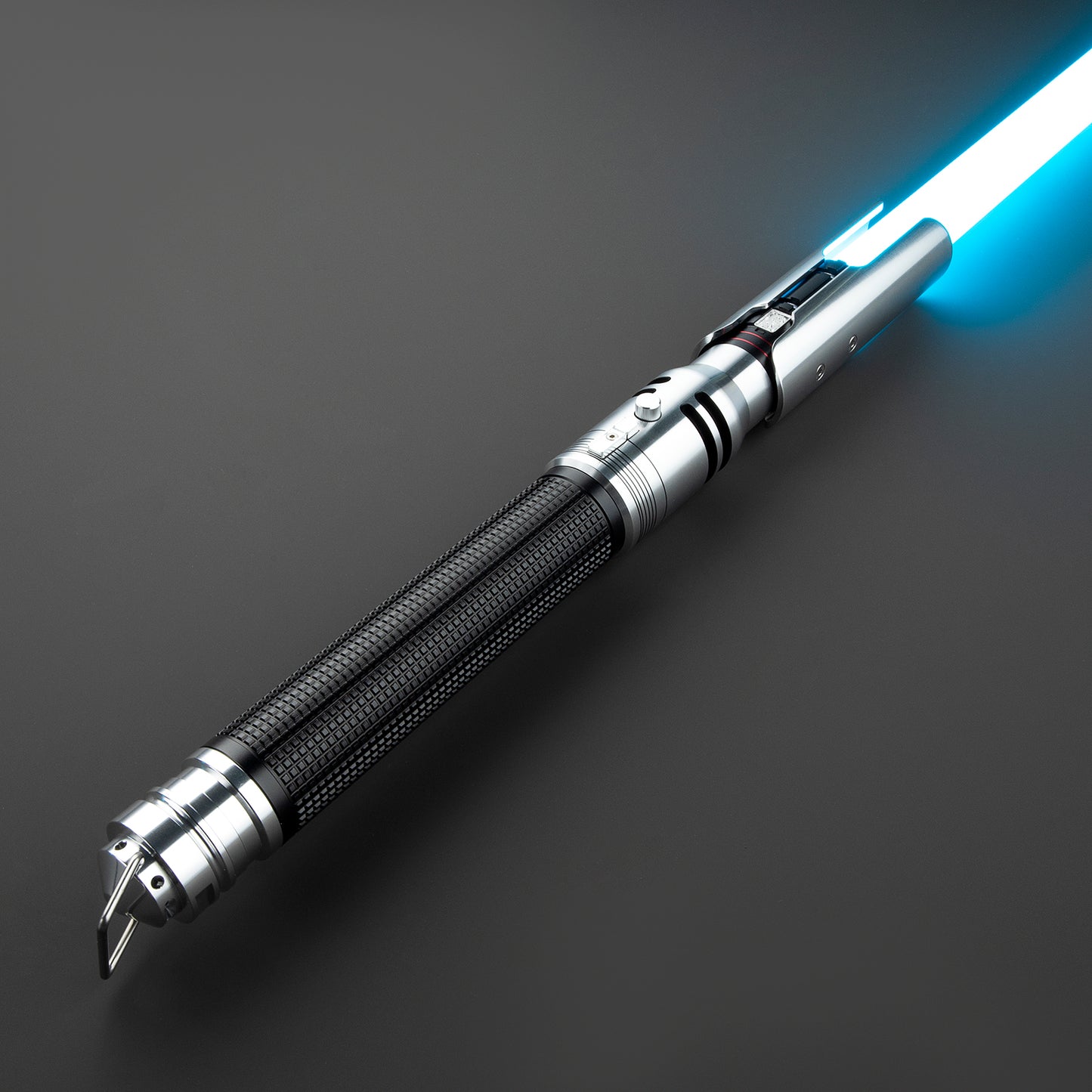 High-polish chrome Cal Kestis lightsaber with radiant blue glow – Battle Sabers