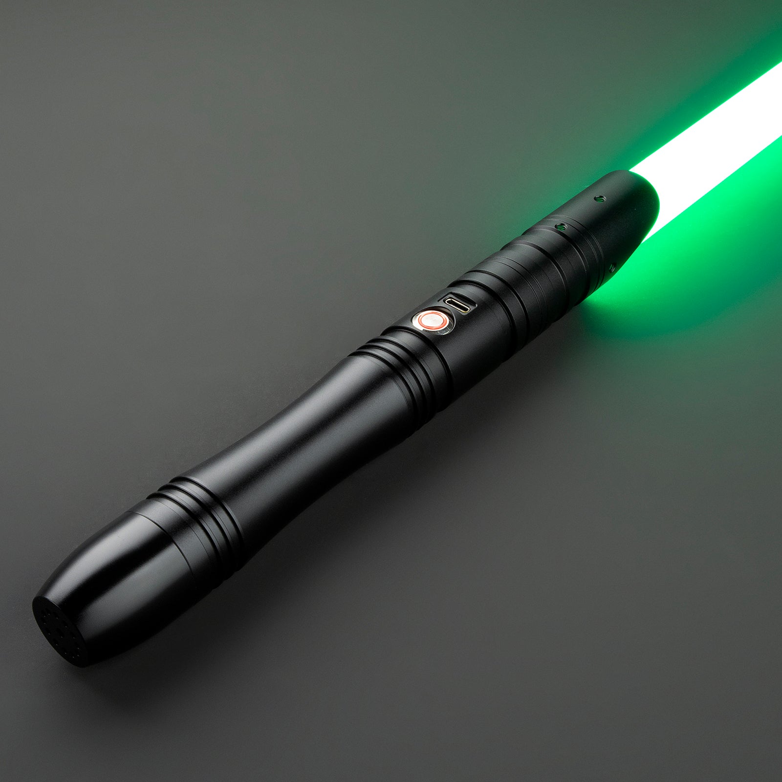 Jovian Light Saber glowing brightly in a dark room - Battle Sabers